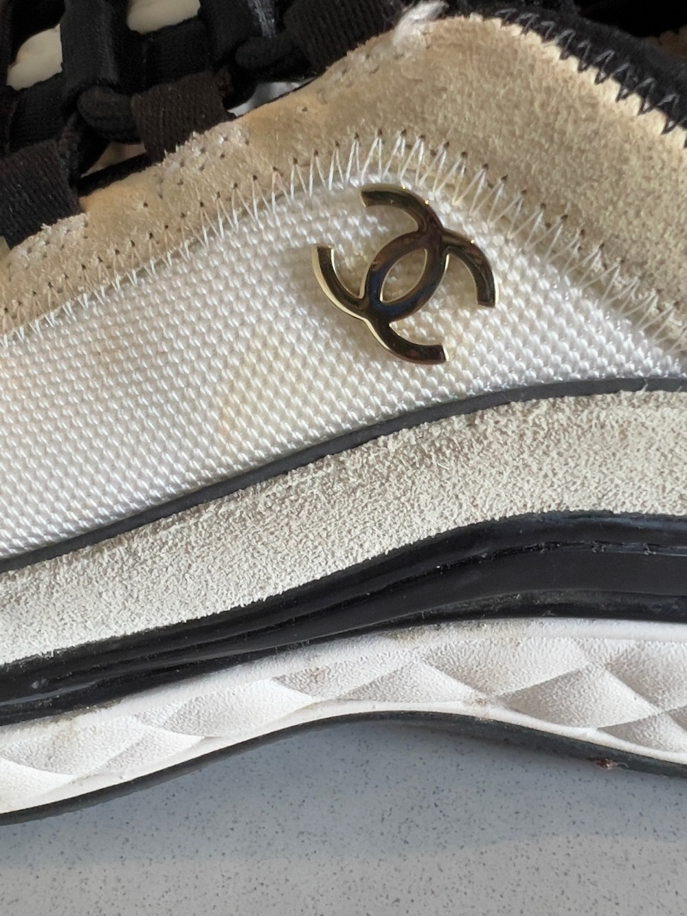 CHANEL Black and White Quilted-Trim Leather & Mesh Sneakers - Picture 8 of 9